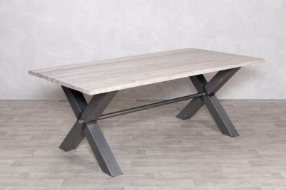 travertine-top-gunmetal-X-based-dining-table